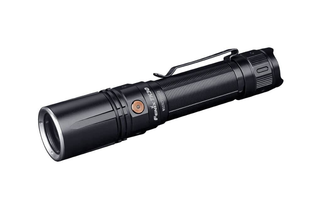 Fenix TK30 tactical flashlight with white laser LED, showcasing its sleek design and compact size.