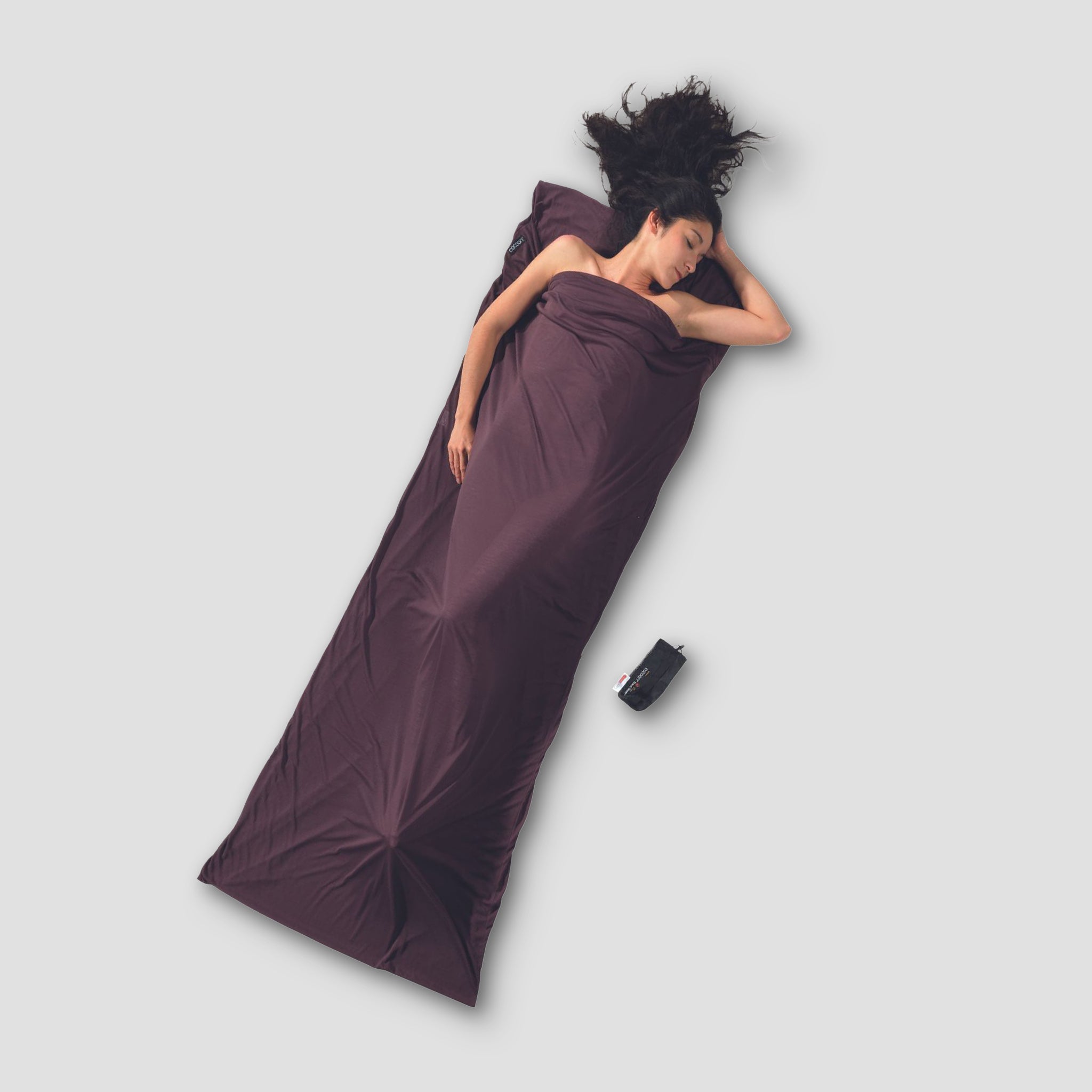 COCOON TravelSheet™ Performer® Thermolite® sleeping bag liner in a compact, lightweight design for travel and camping comfort.