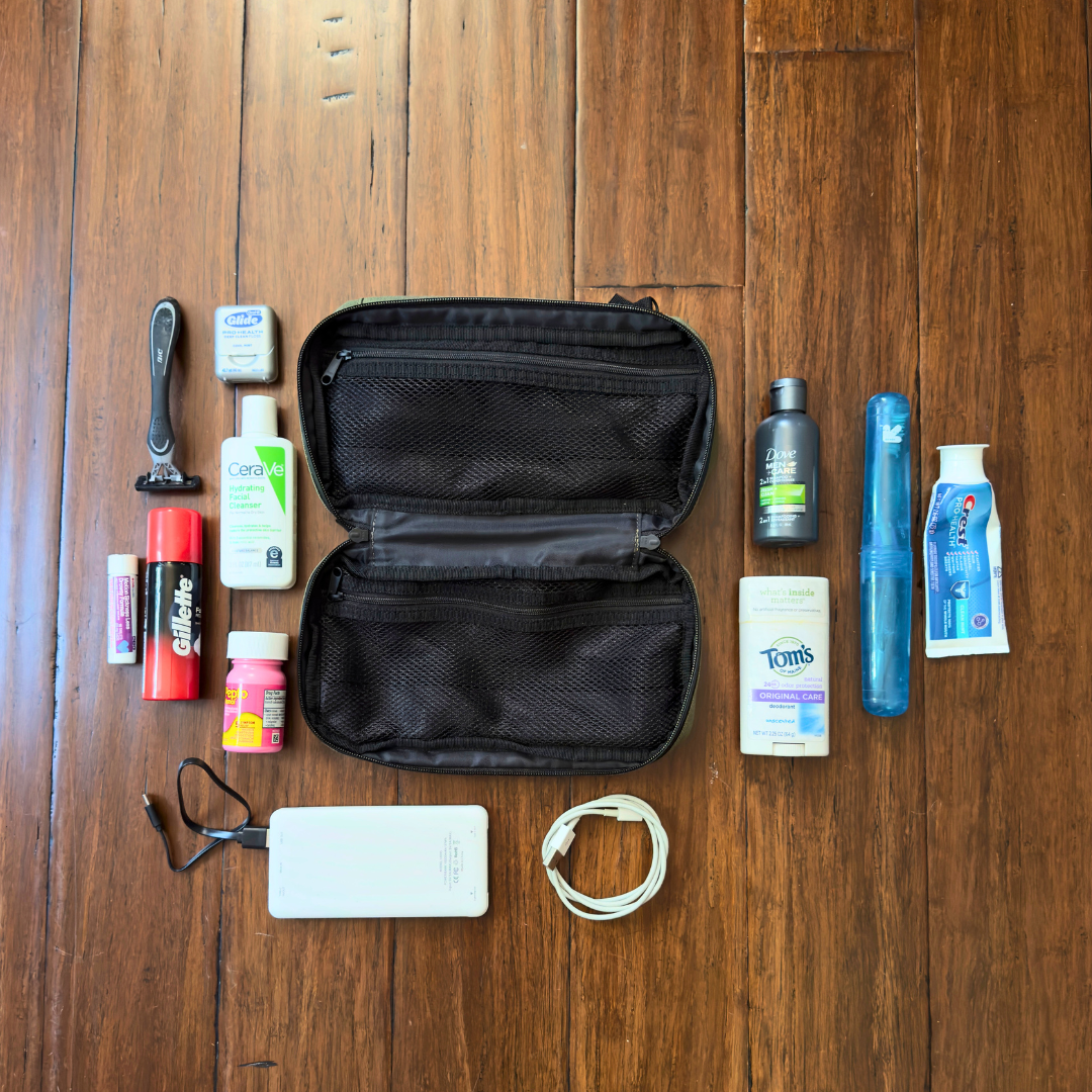 Open COR Surf Travel Bundle Gift Box with toiletry bag and travel essentials inside, perfect for organizing on the go.