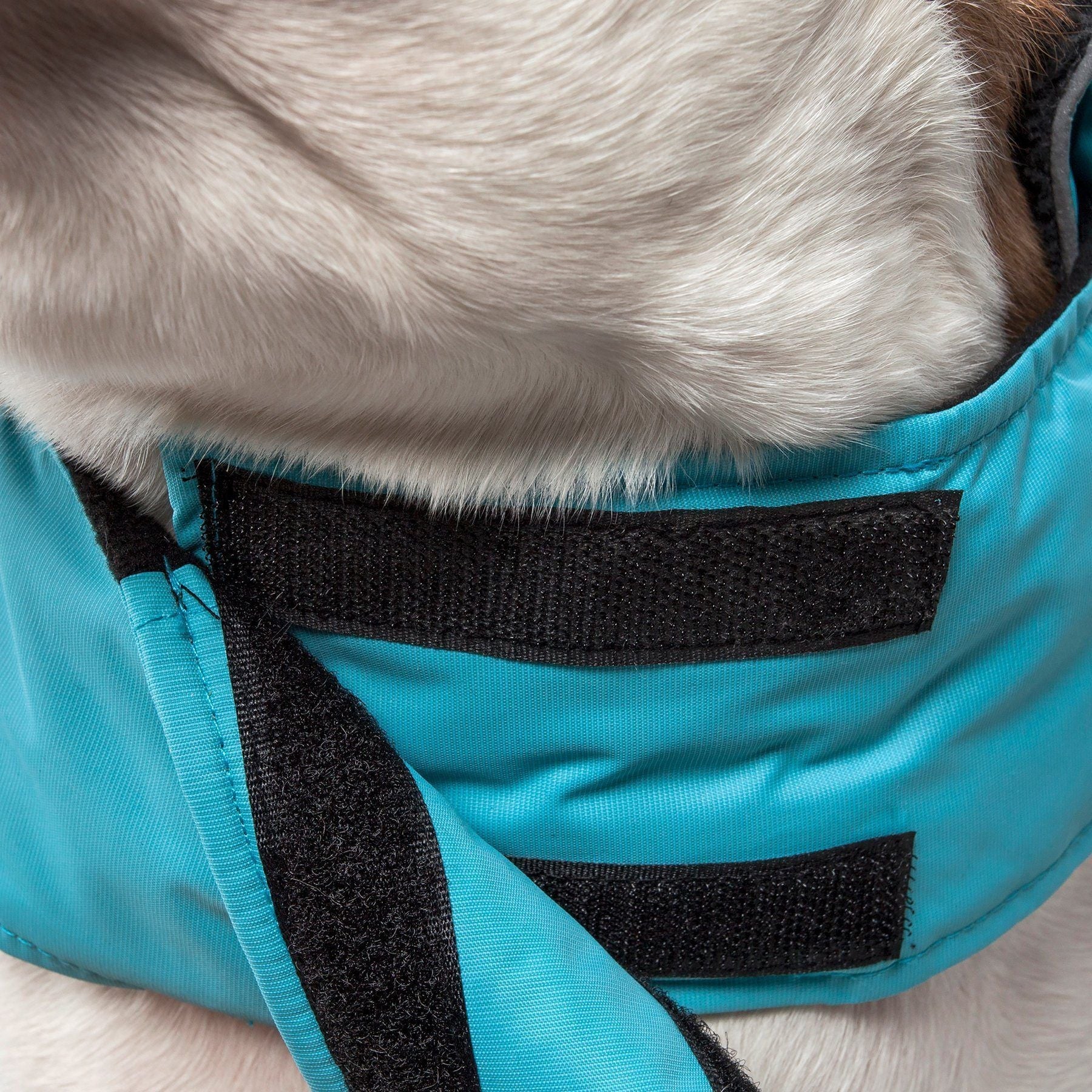 Pet Life Touchdog Lightening-Shield 2-in-1 waterproof dog jacket with removable layers and blackshark technology, suited for outdoor wear.