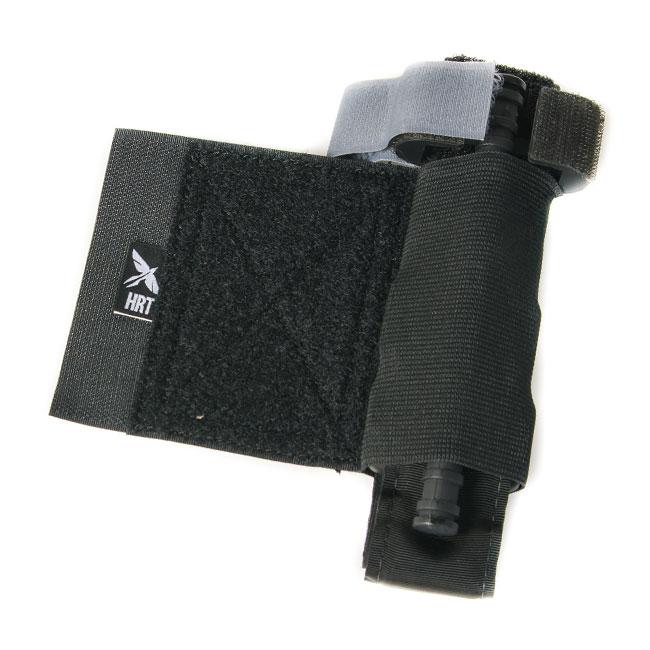 HCC Tactical tourniquet pouch in tactical black, showcasing durable fabric and secure fastening for emergency medical gear.