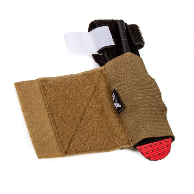 HCC Tactical tourniquet pouch in tactical design, featuring durable materials and secure storage for medical supplies.