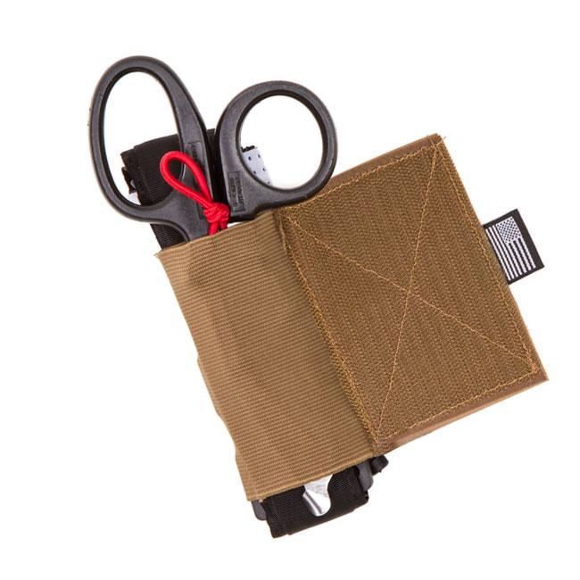 HCC Tactical Tourniquet Pouch V2, featuring durable fabric and secure attachment for tactical gear storage.