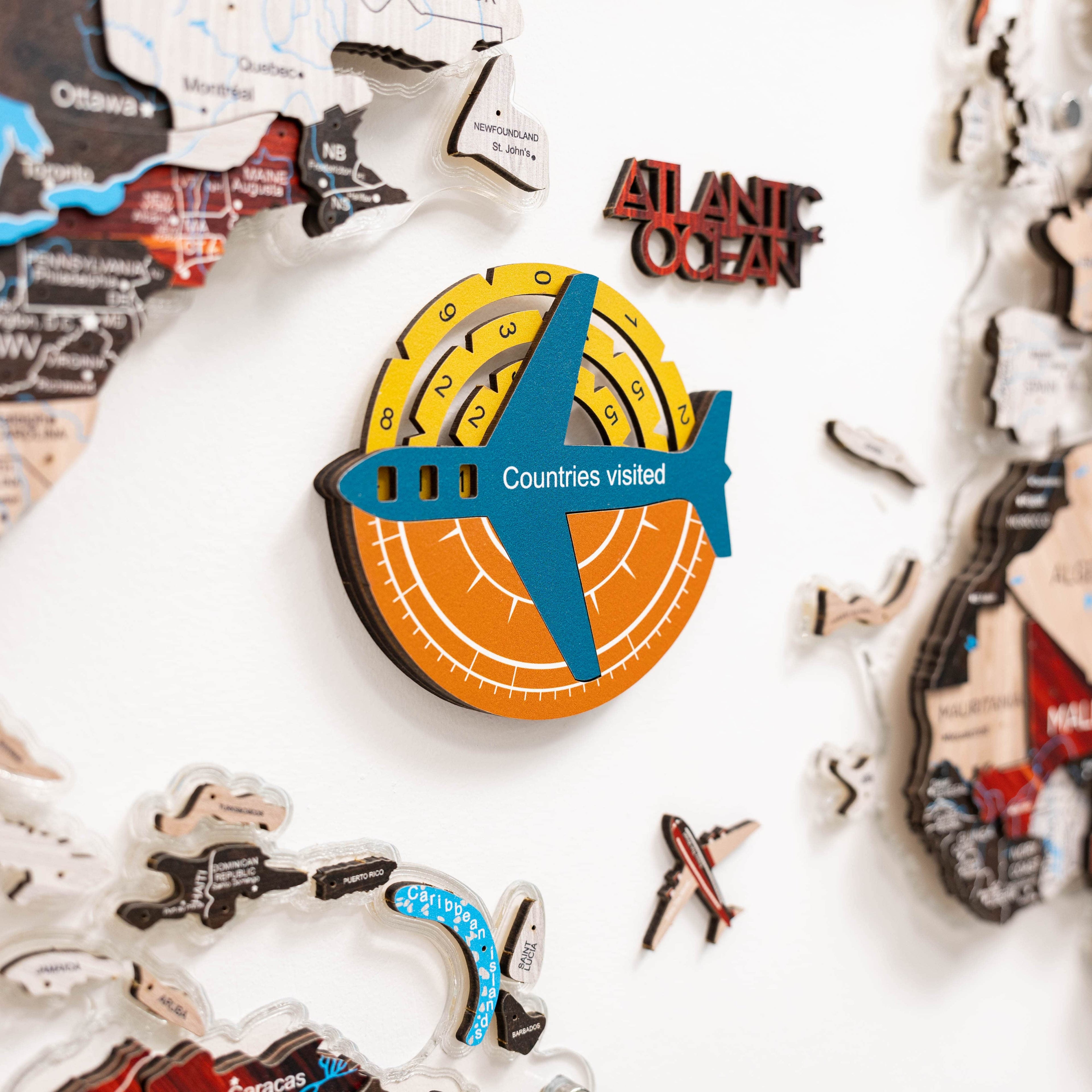 Enjoy The Wood Travel Tracker 3D Colored Wooden World Map, a detailed wooden travel tracker with vibrant 3D continents.