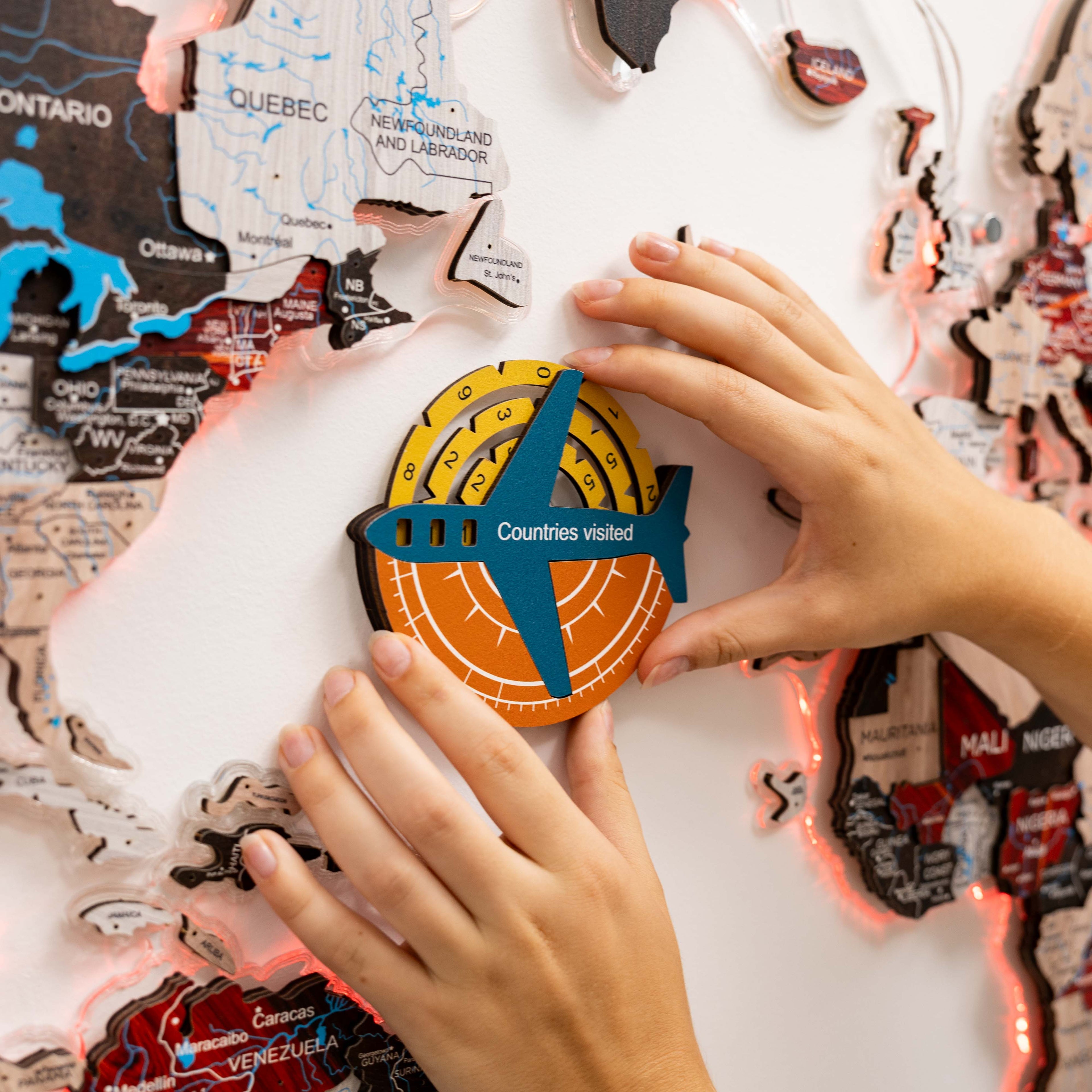 Enjoy The Wood Travel Tracker 3D Colored Wooden World Map featuring a detailed wooden design for tracking travels and adventures.