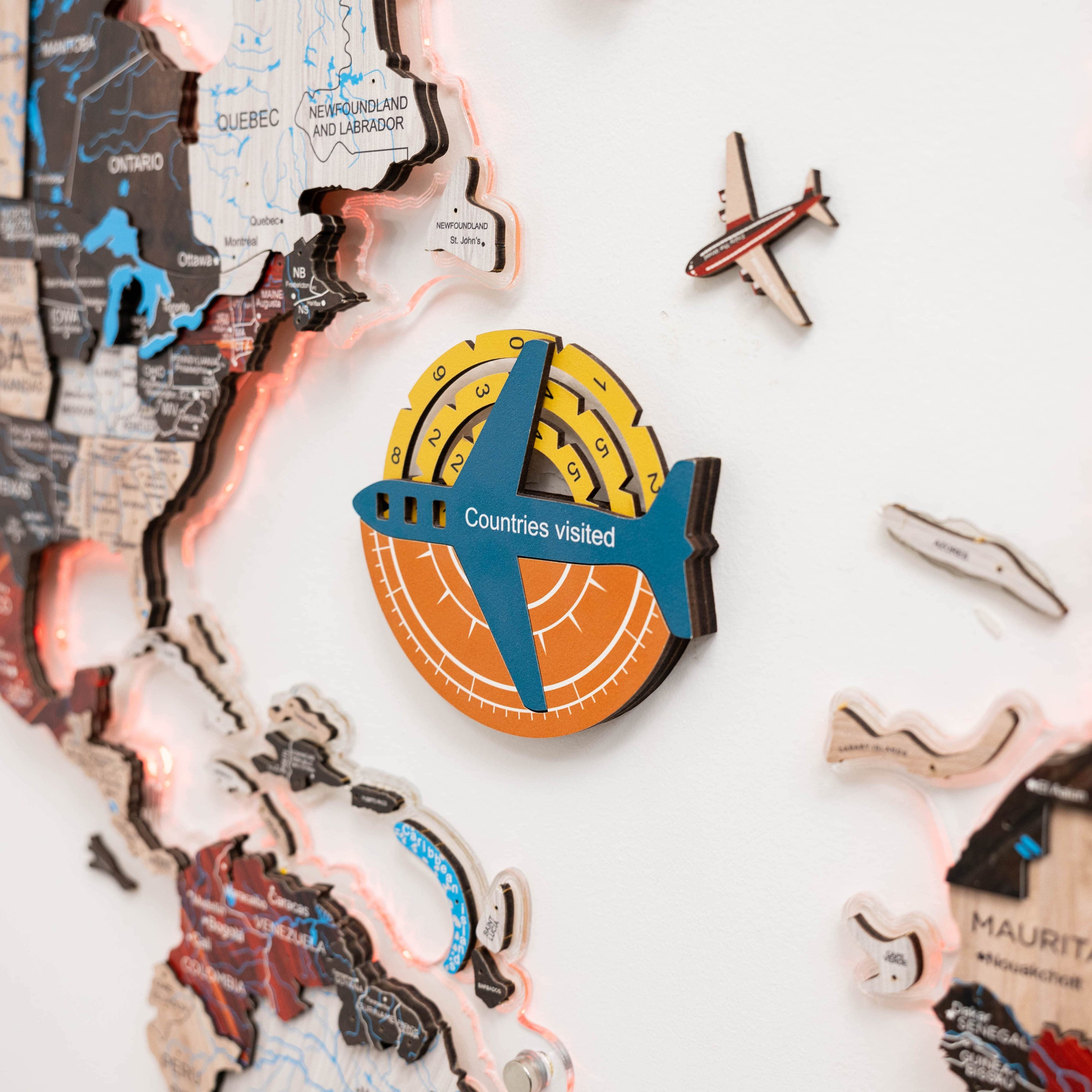 Enjoy The Wood Travel Tracker 3D Colored Wooden World Map, Indie edition, featuring detailed 3D wooden continents and vibrant colors.