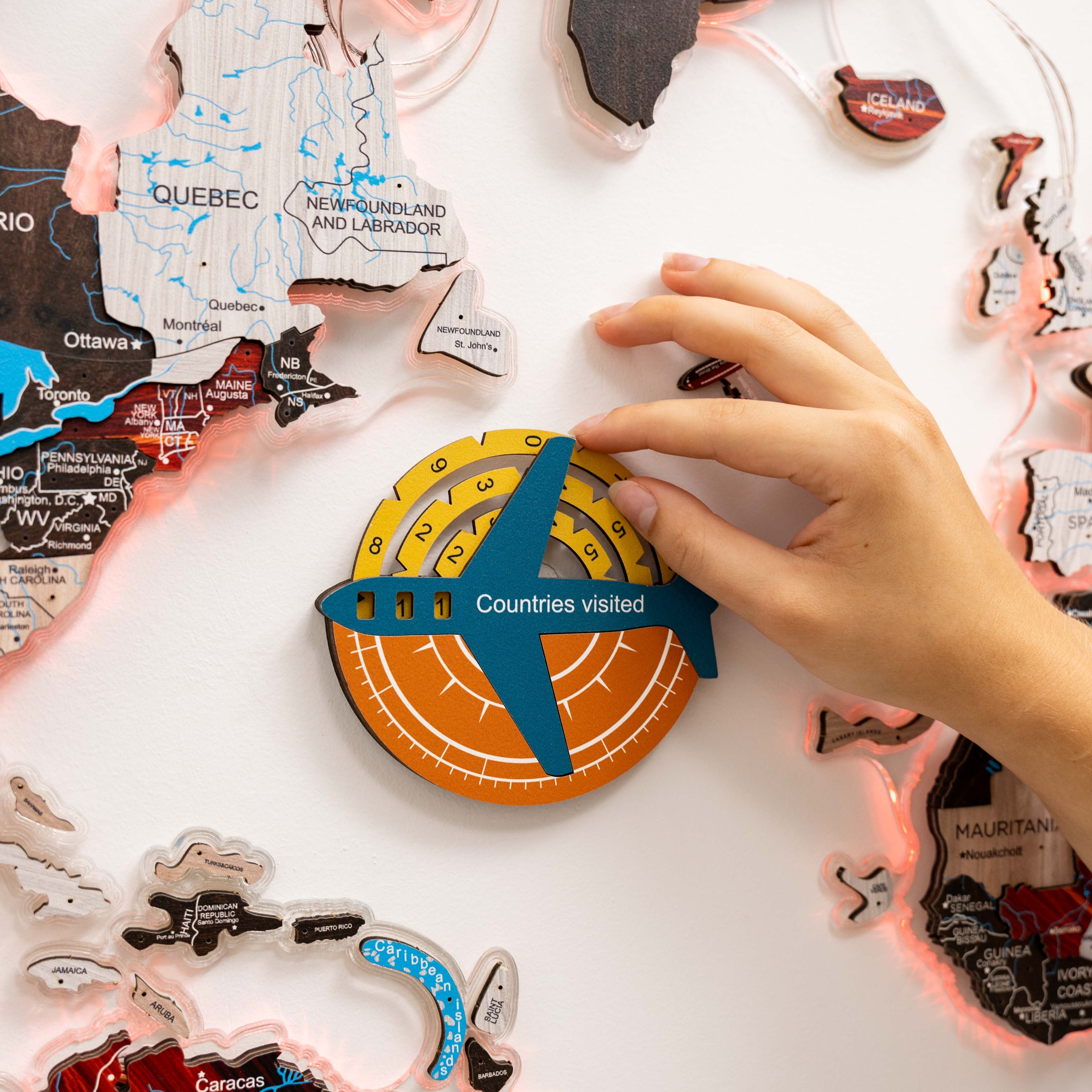 Enjoy The Wood Travel Tracker 3D colored wooden world map with labeled countries and detailed wooden design for travel tracking.