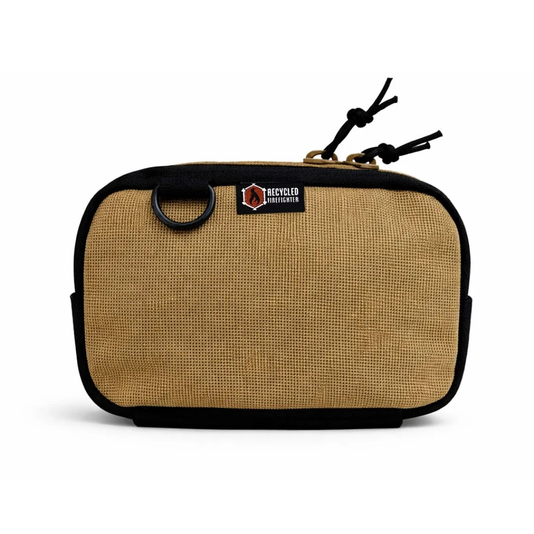 Recycled Firefighter TrailHound Fanny Pack Bunker Gear Edition in brown with adjustable strap and multiple storage compartments.
