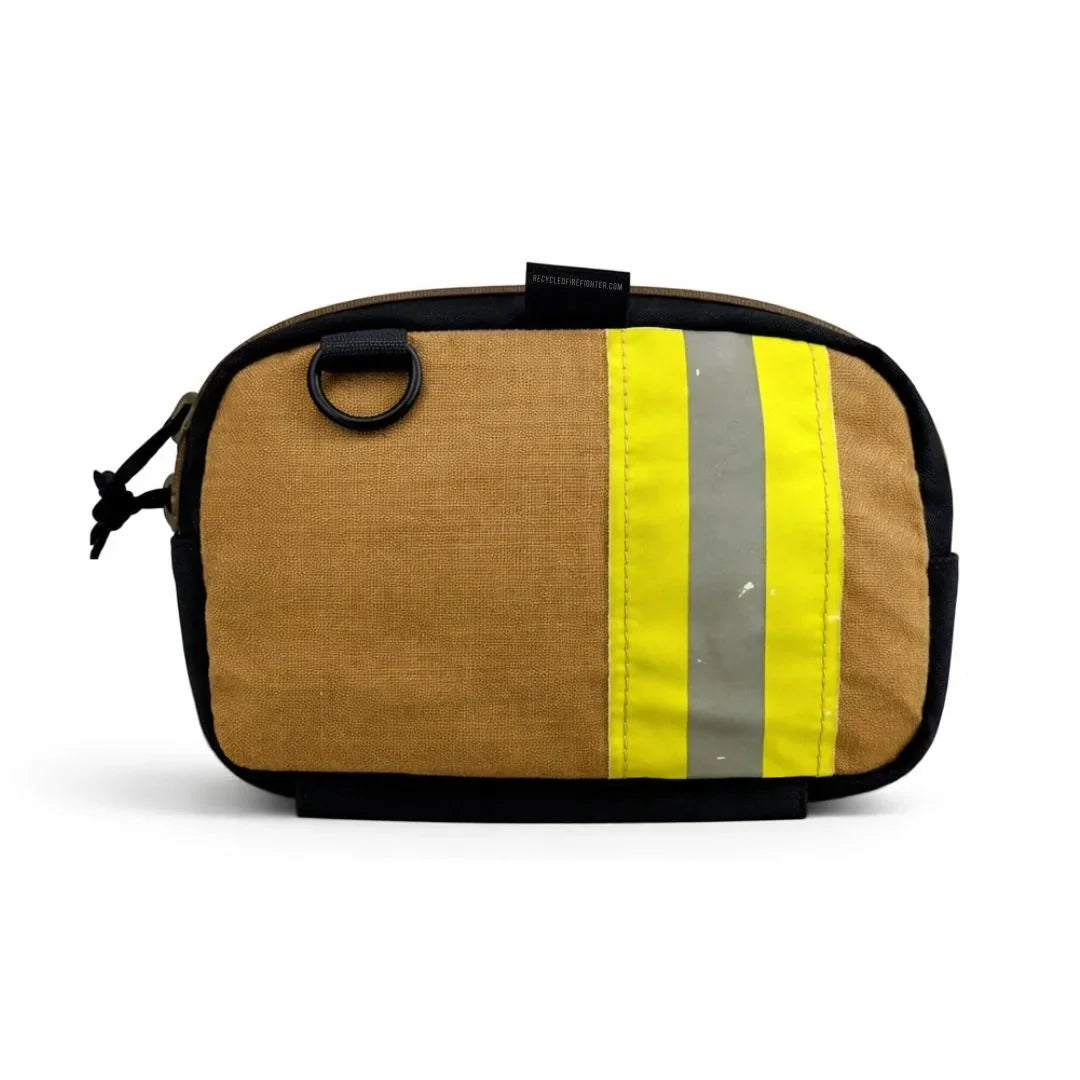 Recycled Firefighter TrailHound Fanny Pack Bunker Gear Edition with multiple compartments and adjustable strap for outdoor activities.