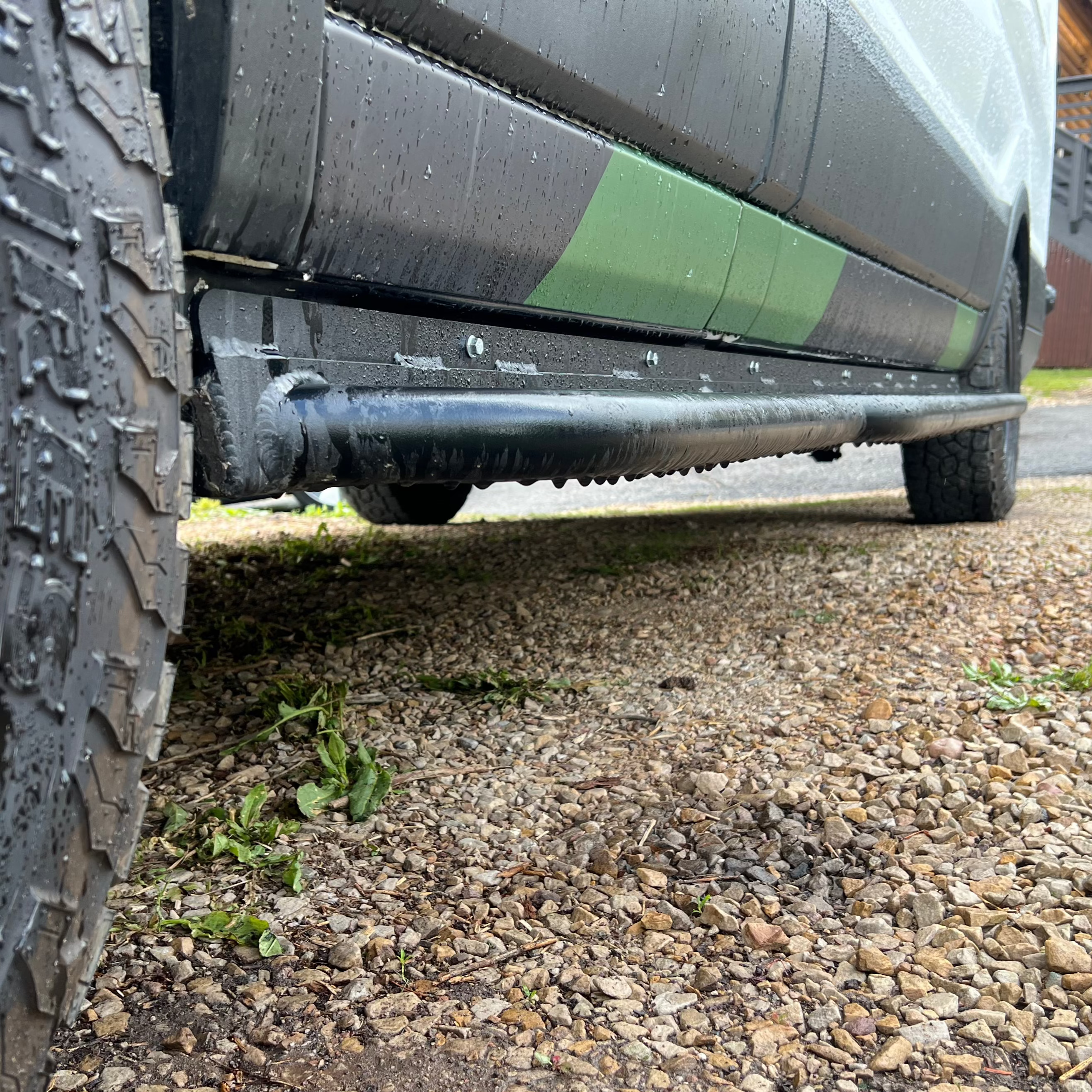 Avatar Offroad Ford Transit Rockbody side steps, durable vehicle side steps attached to a van for easier access and protection.