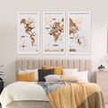 Wooden triptych wall art featuring a smoky white world map from Enjoy The Wood, displayed on a wall.