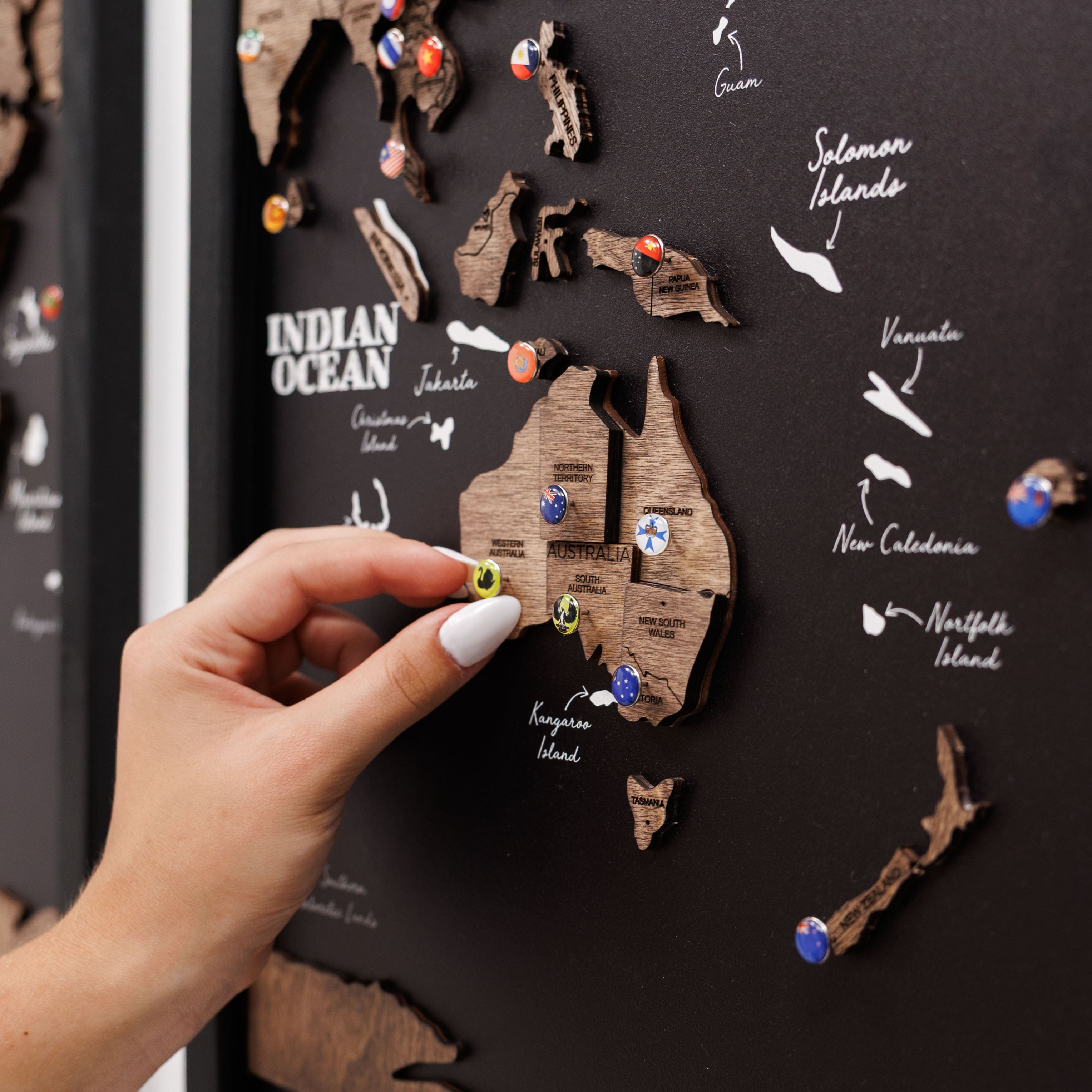 Dark walnut wooden triptych world map by Enjoy The Wood, showing detailed, natural wood grain and three-panel display.