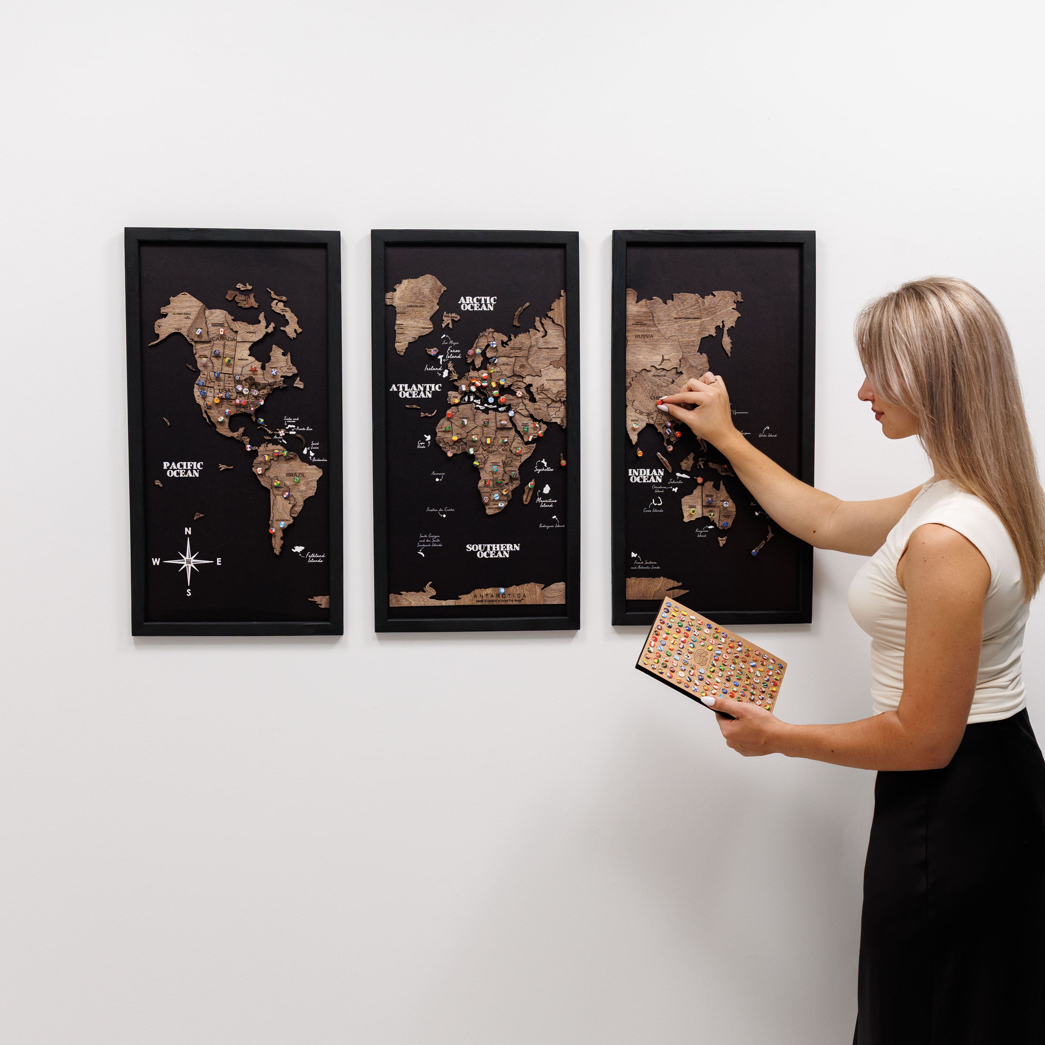 Dark walnut wooden triptych world map by Enjoy The Wood, featuring three panels with detailed global country outlines.