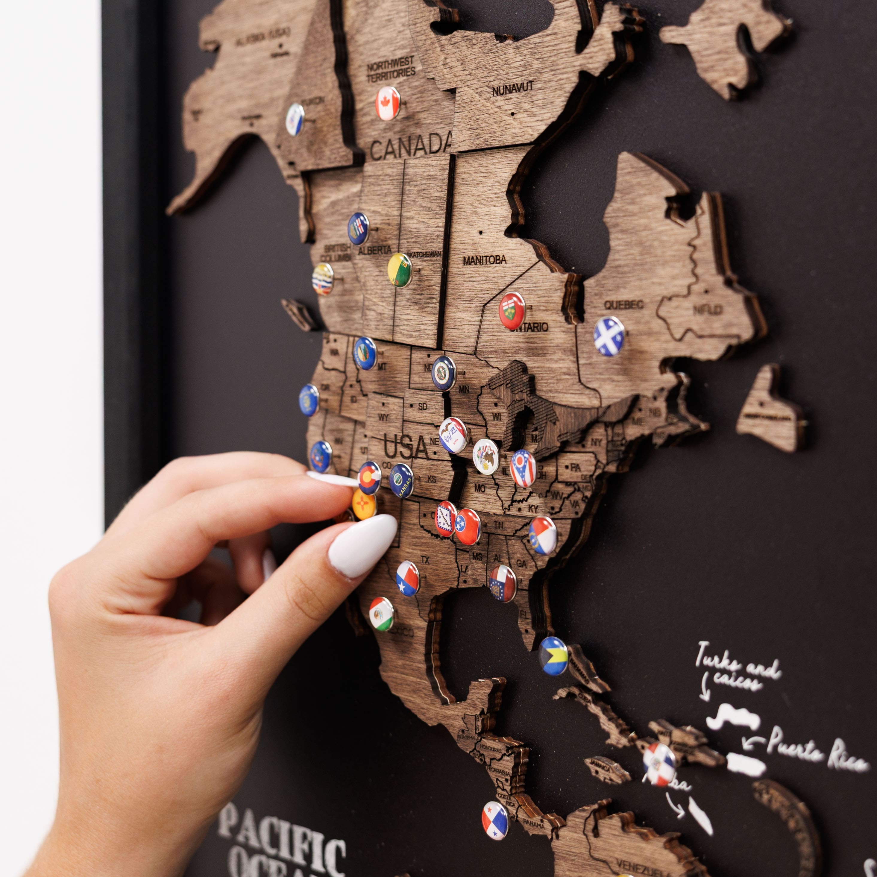 Dark walnut wooden triptych world map by Enjoy The Wood, featuring three panels with detailed geographic design.