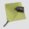COCOON ultralight microfiber towel draped over a surface, showcasing its lightweight, soft, and quick-drying fabric.