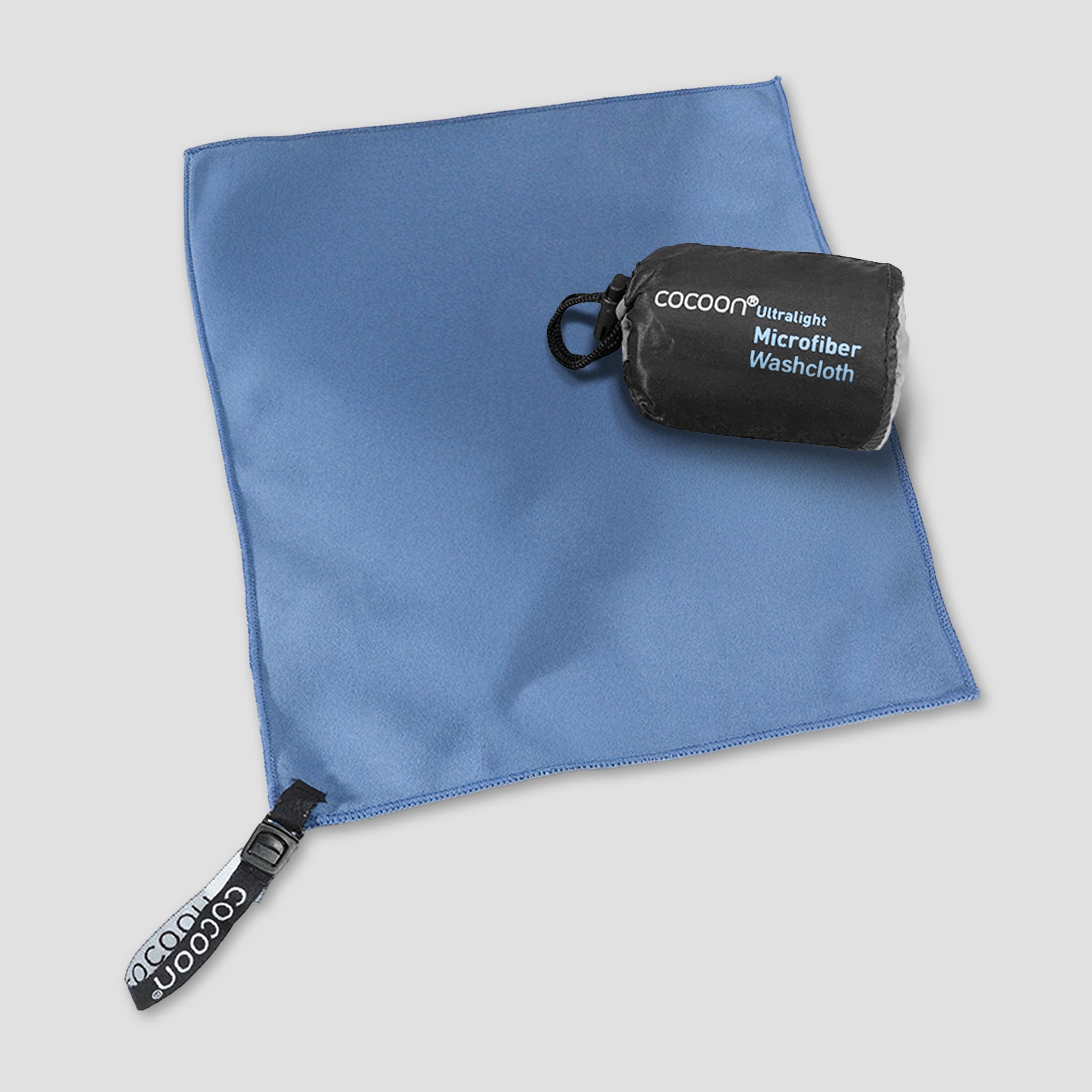 COCOON ultralight microfiber towel spread out showing its soft, quick-drying fabric ideal for travel and outdoor use