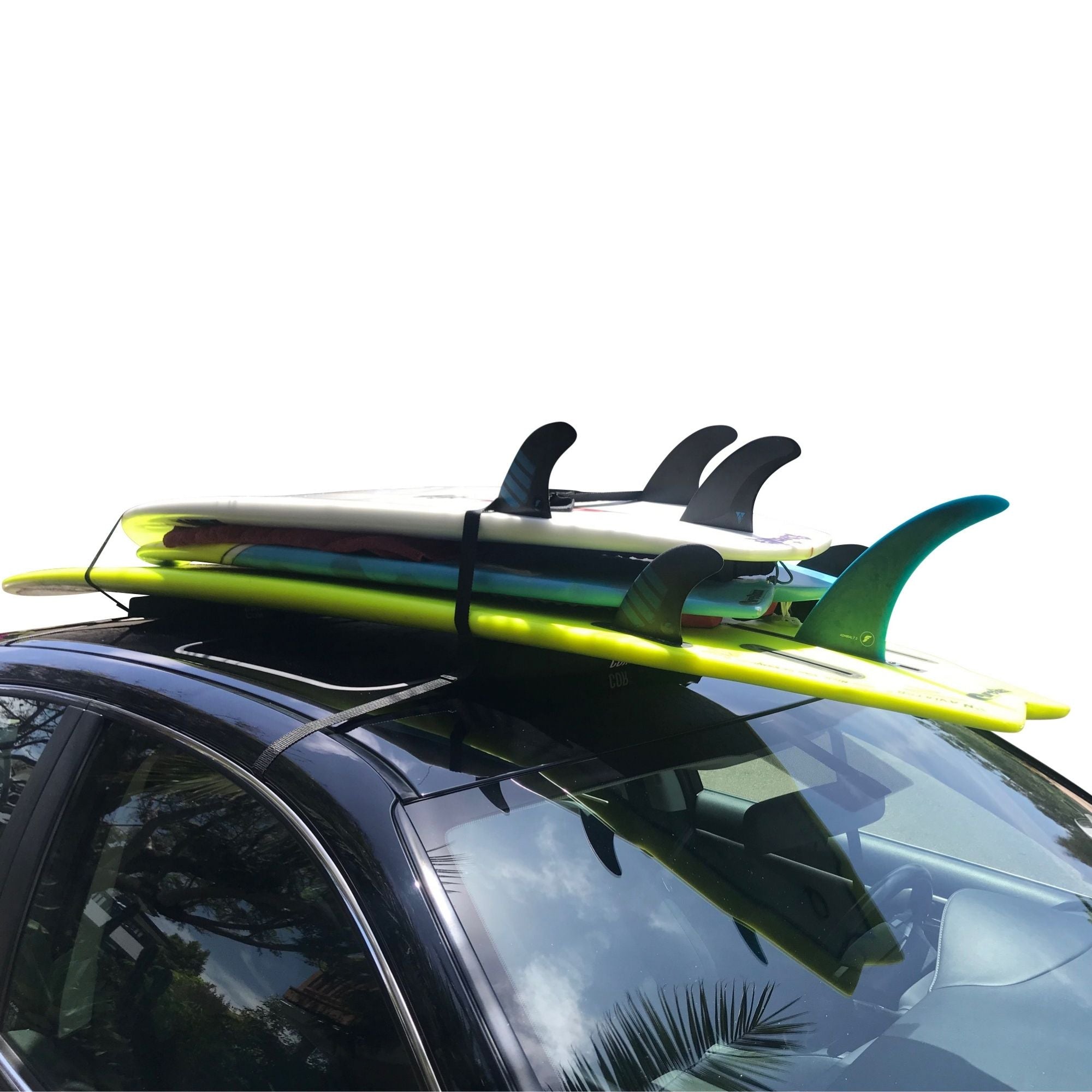 COR Surf universal soft car roof rack for surfboards, SUPs, canoes, and kayaks, featuring adjustable straps and padded supports.
