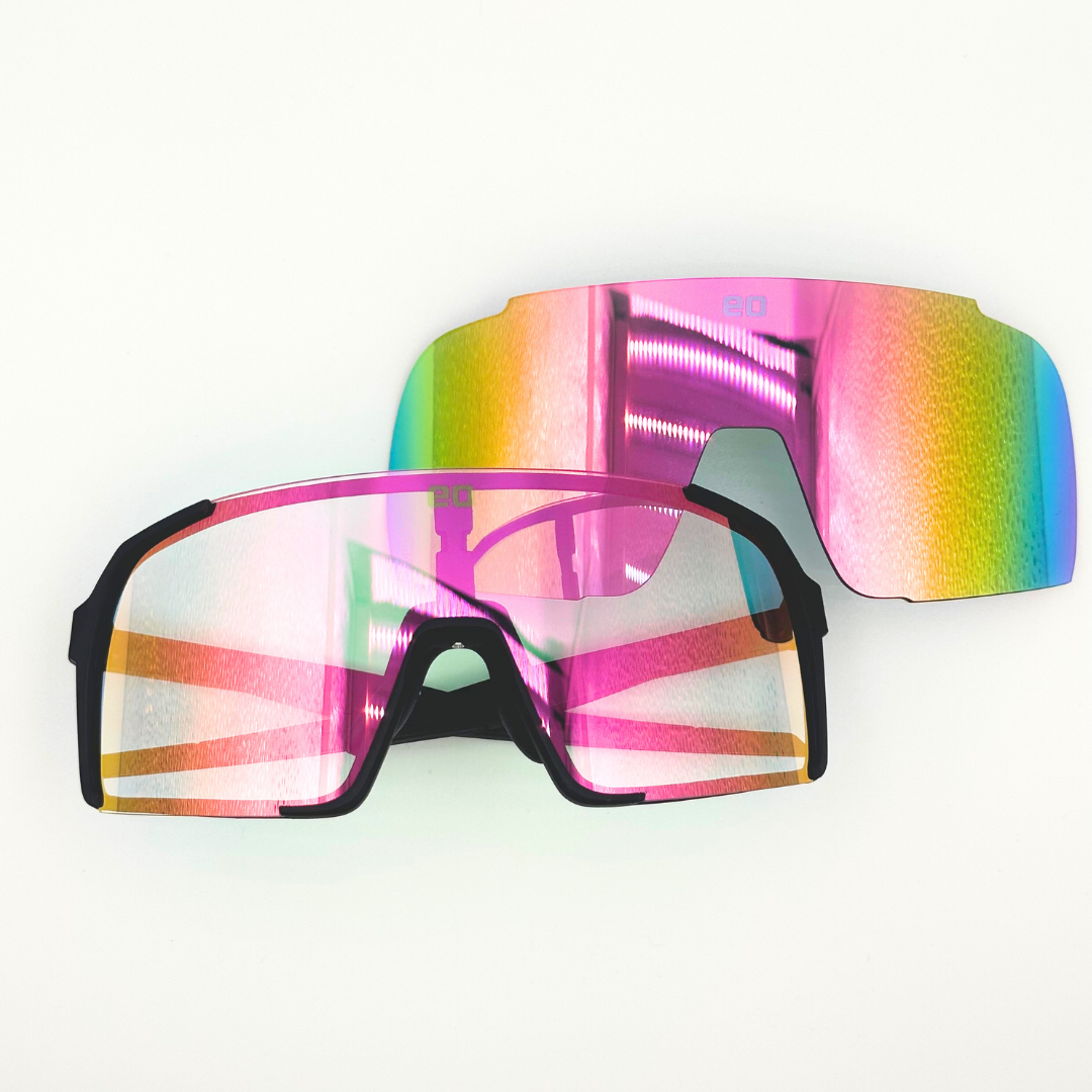 Eastern Outer Uno Mas Photochromic+ sunglasses with black and pink lenses, folded, showcasing stylish and versatile eyewear.