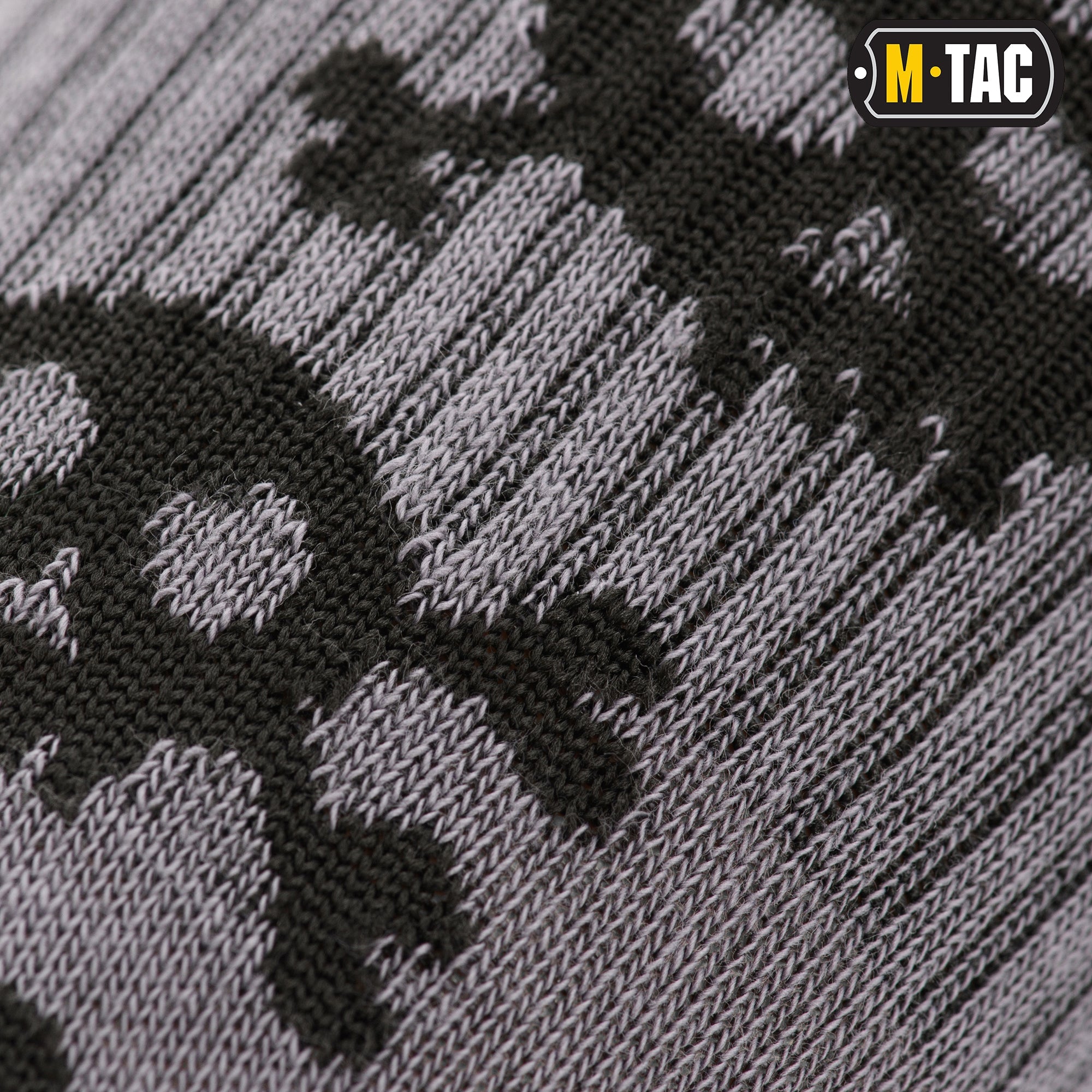 Lightweight M-Tac mid-calf socks featuring a pirate skull design, ideal for tactical or casual wear.