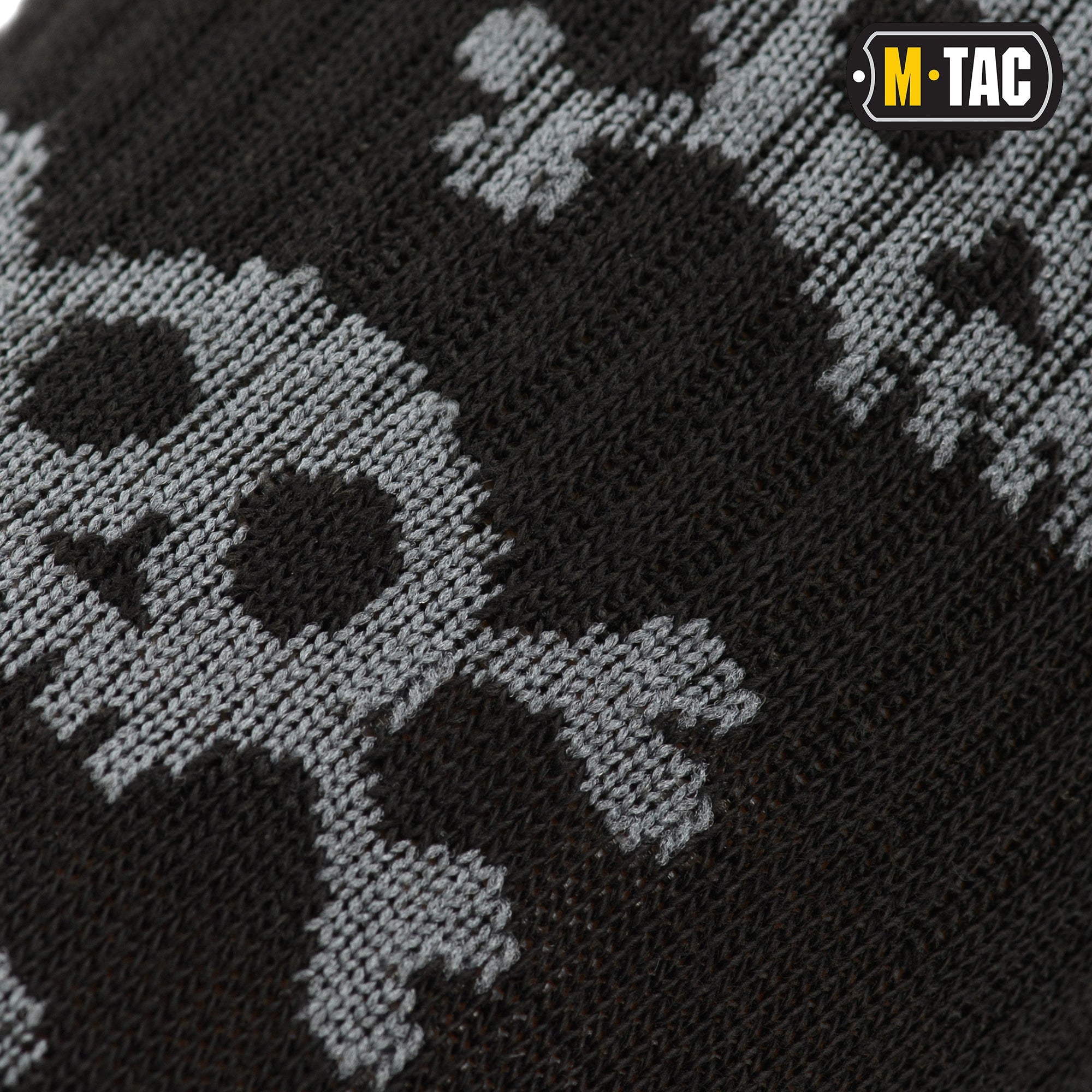 Lightweight M-Tac mid-calf socks featuring a pirate skull design, perfect for tactical or casual wear.