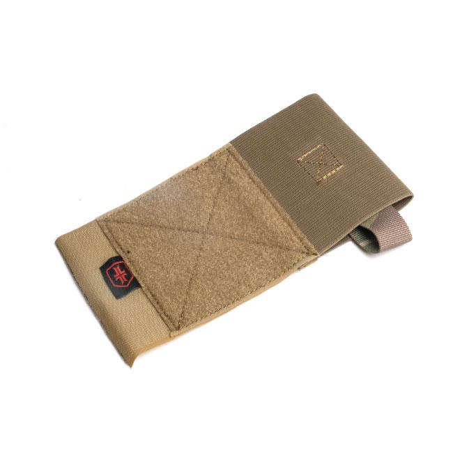 HCC Tactical Warrior Poet Society Multi Hanger Pouch in a tactical setting, showcasing durable fabric and multiple attachment points.
