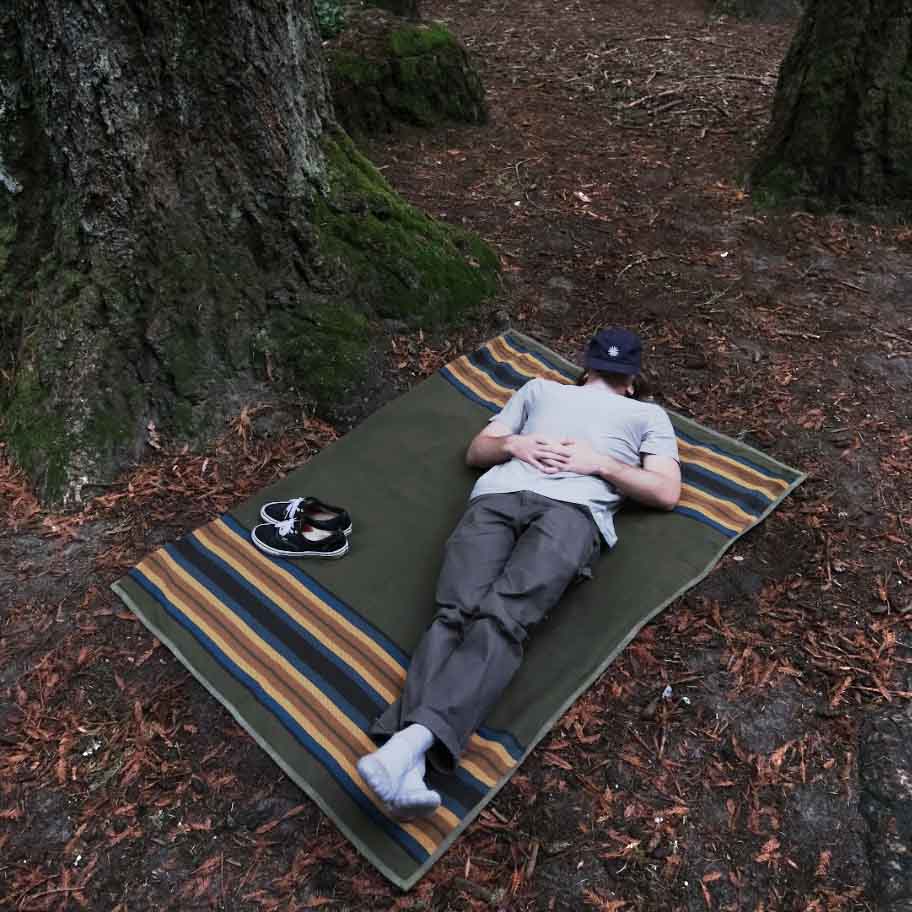 West Path waxed canvas camping blanket, outdoor bushcraft throw blanket with durable, weather-resistant fabric for camping and outdoor use.