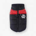 Red Wilderness Shield vest coat by The Wild Paw, featuring durable outdoor gear with adjustable straps and rugged design.