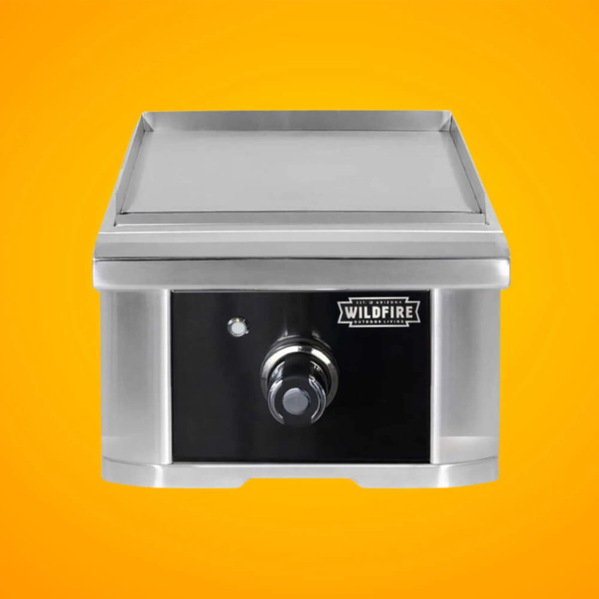 15-inch stainless steel side griddle by Wildfire Outdoor Living, designed for outdoor grilling and cooking versatility.