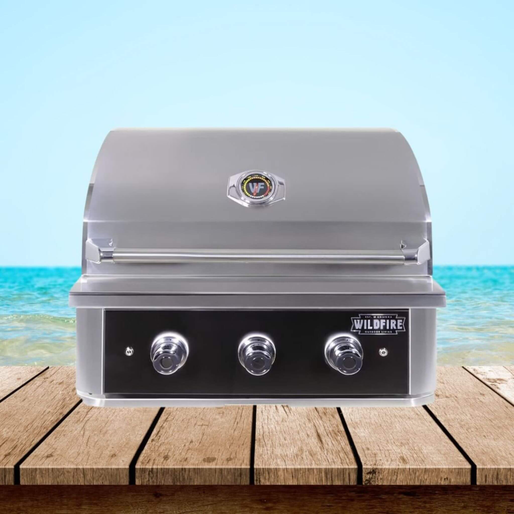 30-inch Wildfire Ranch Pro stainless steel outdoor grill with natural gas connection, showcasing its sleek design and durability.