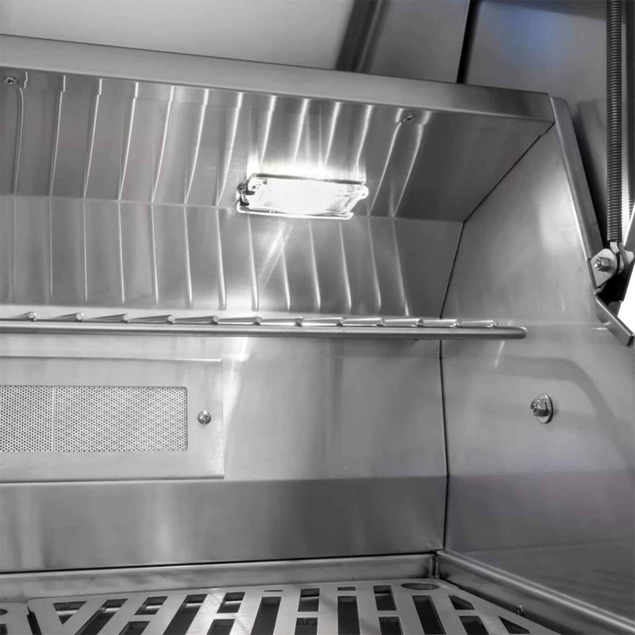 Wildfire Ranch Pro 42-Inch stainless steel grill with natural gas connection, showcasing sleek design and spacious cooking area.