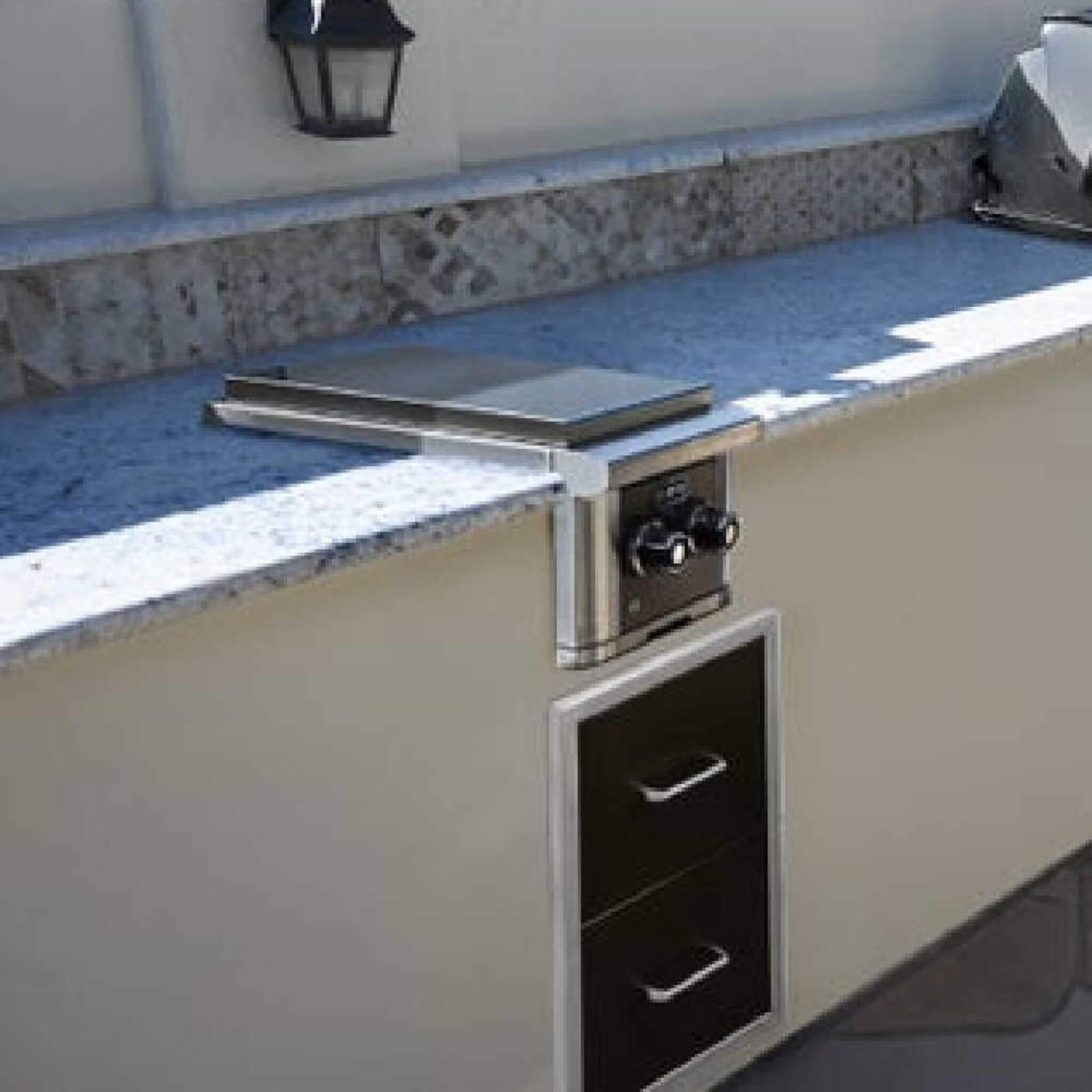 Wildfire Ranch Pro 24-Inch Stainless Steel Power Burner, outdoor view showcasing its sleek design and durable construction.