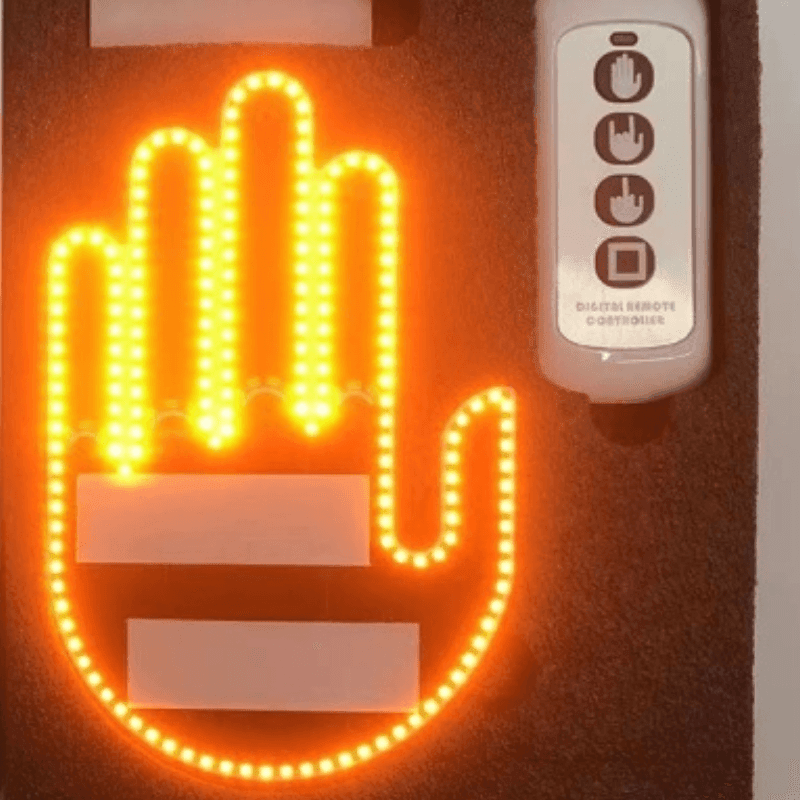 Wireless motorcycle windshield gesture light with remote control by Bean's Moto Booth, showing illuminated LED indicators on a motorcycle windshield.