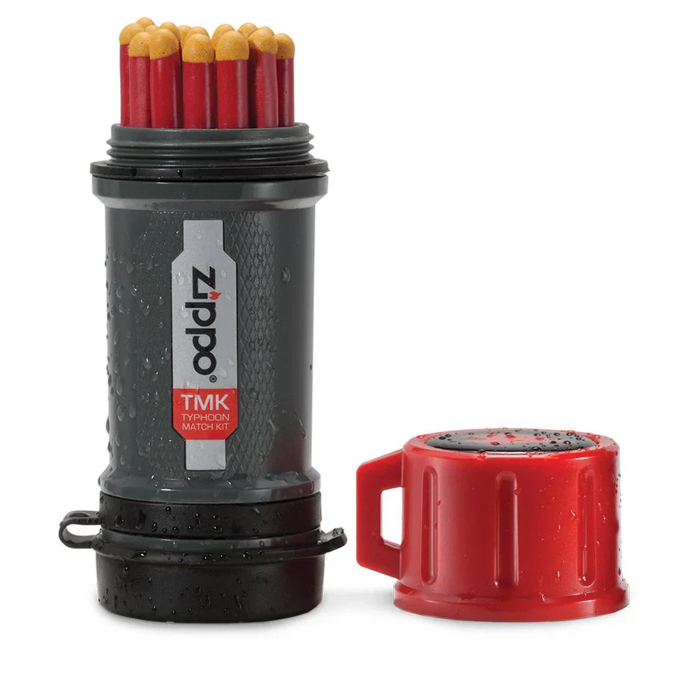 Zippo Typhoon Match Kit with waterproof case, striking matches, and survival gear for outdoor adventures.