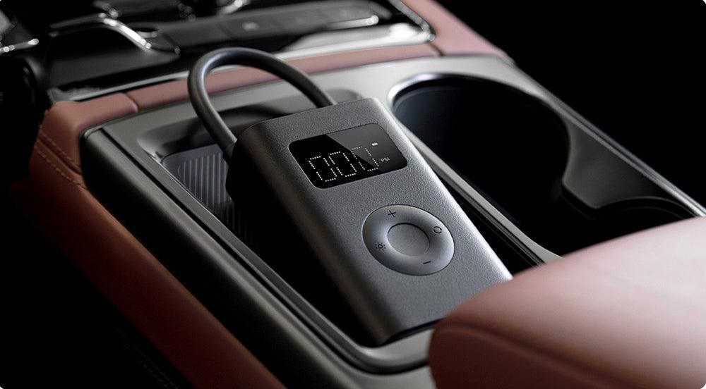 Xiaomi Mijia Portable Electric Air Inflator 2 from Bean's Moto Booth, compact air pump with digital display and nozzle attachments.