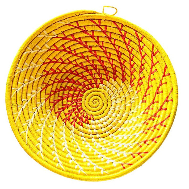 Large yellow woven African basket by Reflektion Design, showcasing intricate handwoven patterns and vibrant color.