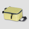 COCOON Discrete Light Packing Cubes travel organizers in various colors, compact and lightweight for efficient packing.