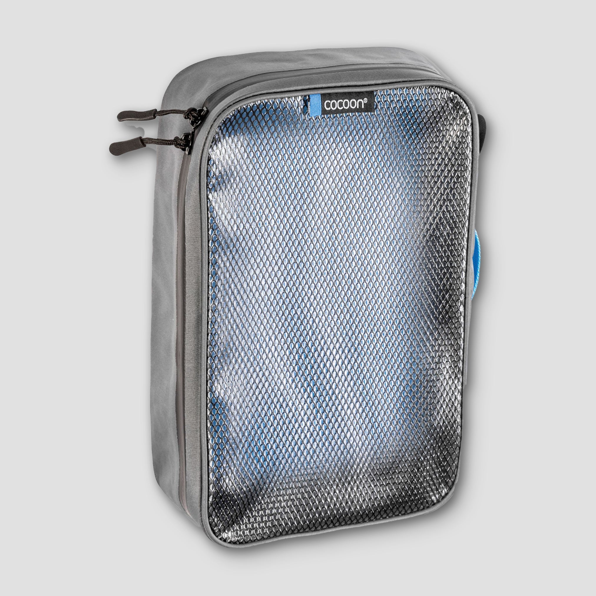 COCOON laminated packing cube for dirty or wet clothes, compact storage solution with waterproof top for organized travel packing.