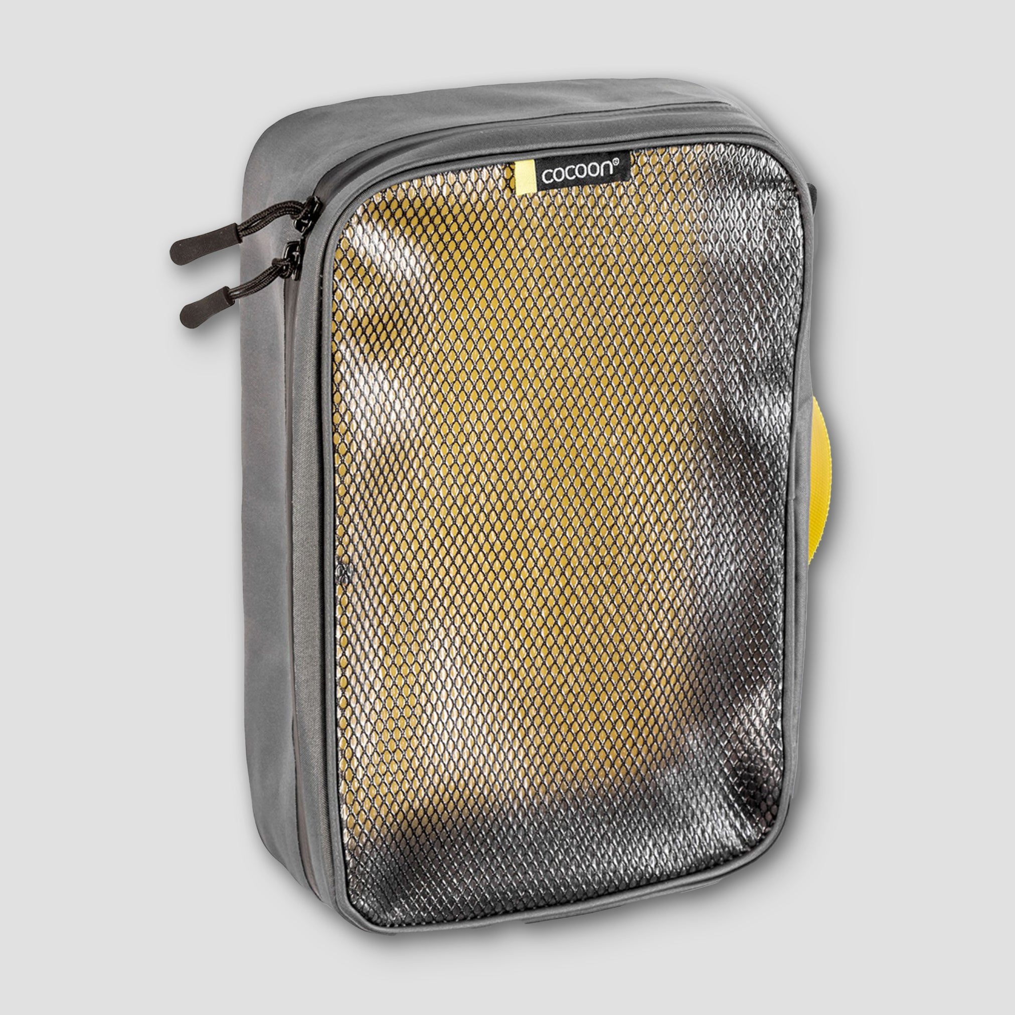 Cocoon laminated packing cube for dirty and wet separation, showing waterproof fabric and compact design for travel organization.
