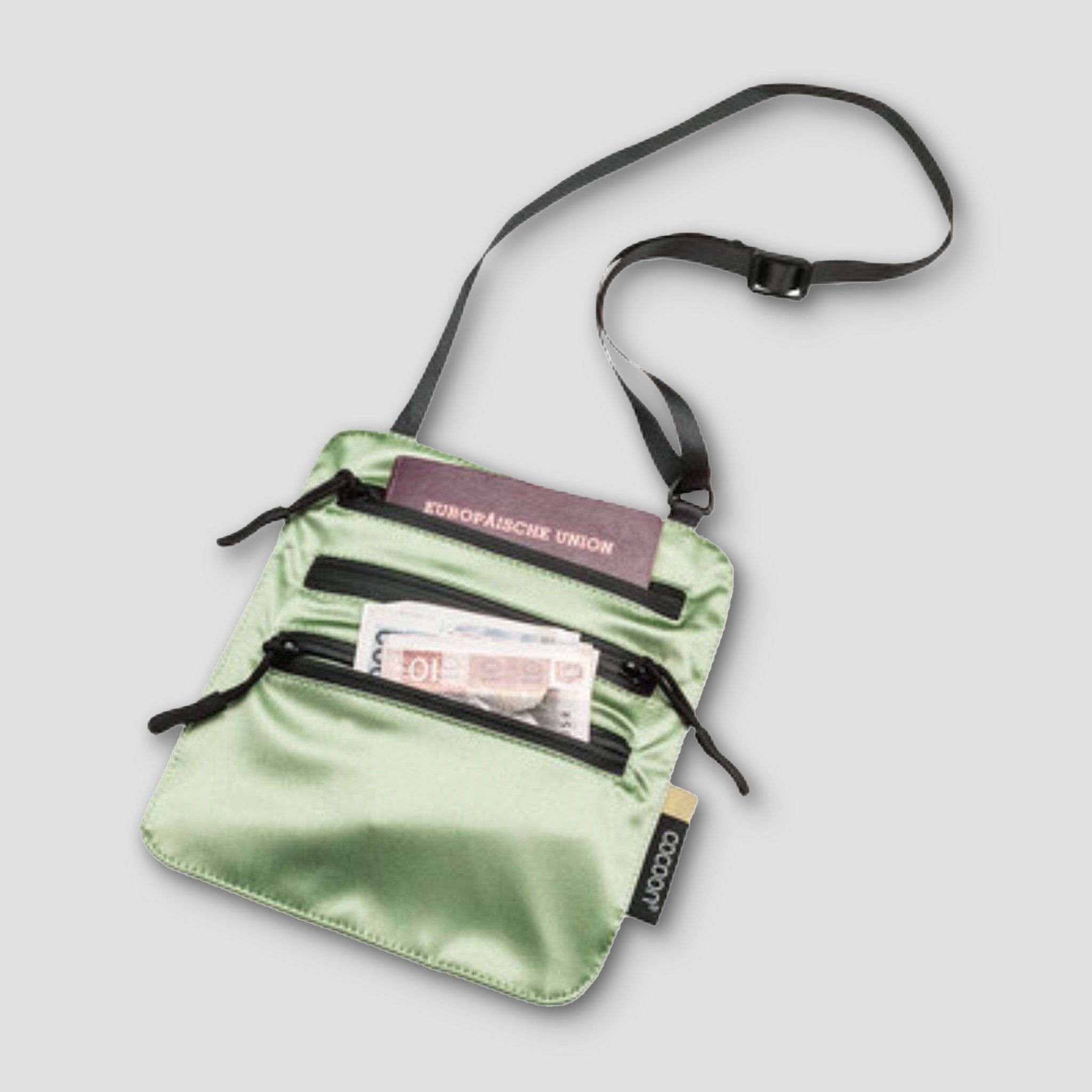 Cocoon Secret Neck Wallet Monsoon Silk RFID with sleek silk design and multiple compartments for secure travel storage.