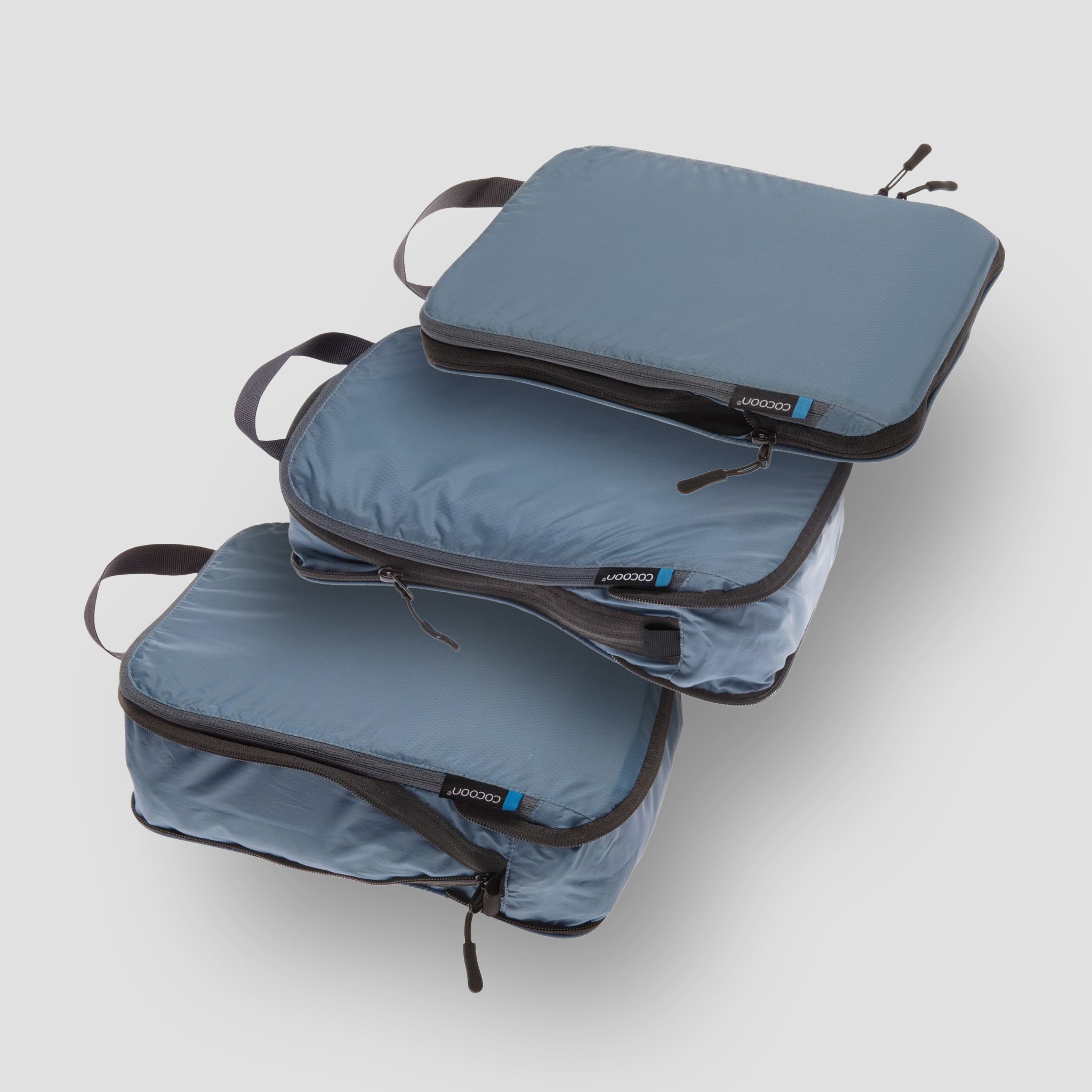 COCOON Squeezer Light Compression Packing Cube for efficient travel organization and space-saving packing.