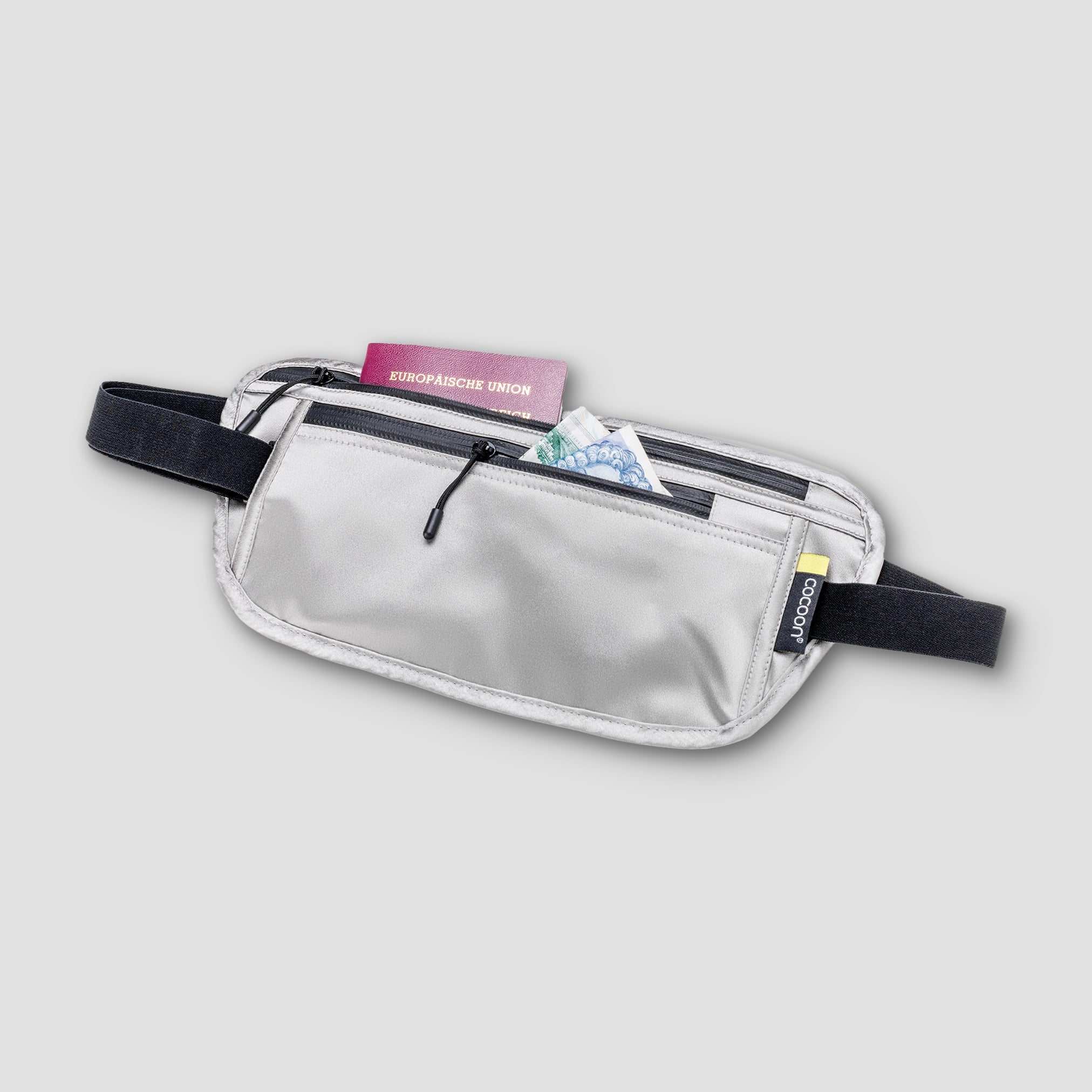 Cocoon Monsoon Silk waist wallet with sleek design, featuring secure compartments for valuables, made from luxurious silk fabric.